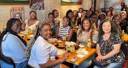 Students enjoying Japanese food and sweets while on a sightseeing trip