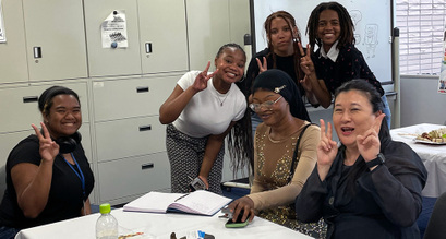 Program director Professor Shiguemi Ichiyama poses with Spelman students on the final day