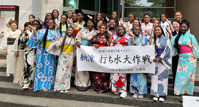 Students posing with kimono in front of the Mizuta Museum of Art