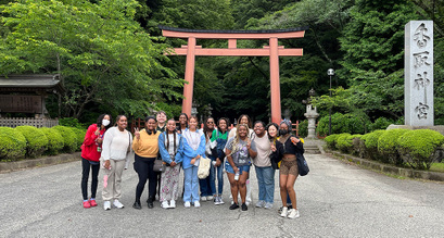 Students at the front gate to the park outside of Katori Shrine